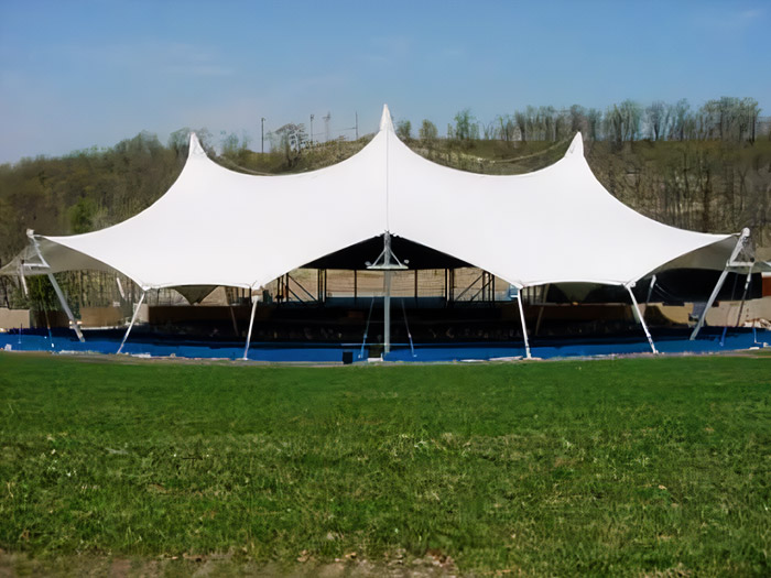 What are the uses and advantages of tensile structures?