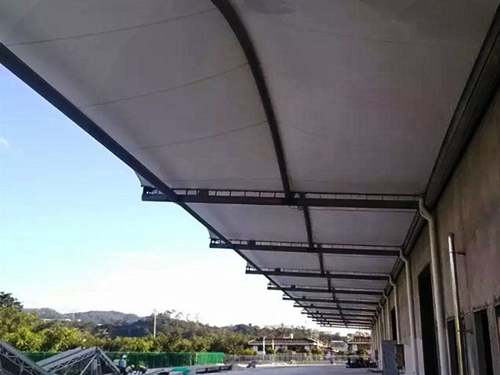 Tensile structures for industrial factory warehouse entrance